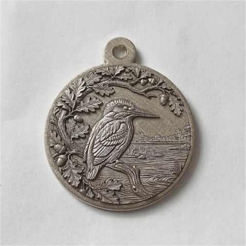 A kingfisher sterling silver 3D relief pendant