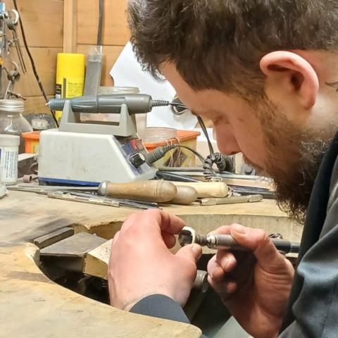 Signet ring manufacturer at his bench in Hertfordshire